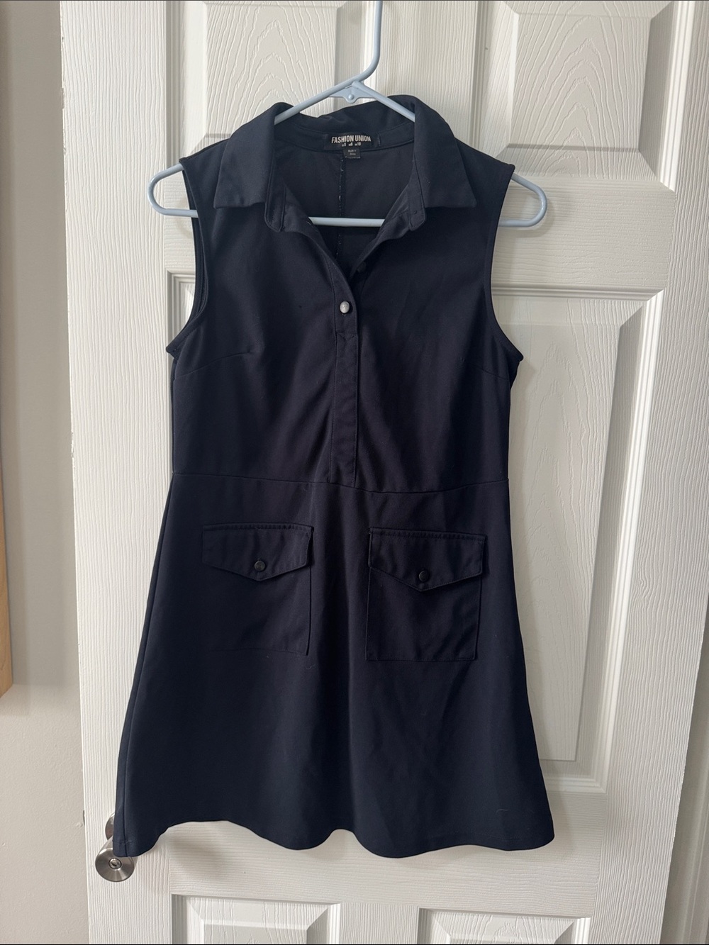 Sleeveless Collared Black Dress with Front Pockets